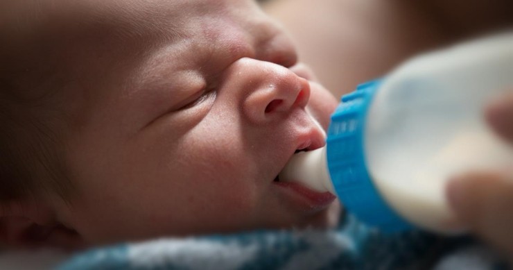 1 month baby vomiting after feeding